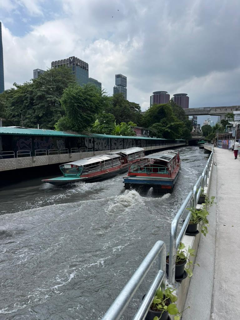 Khlong boats and the covered pier, Jim Thompson House.