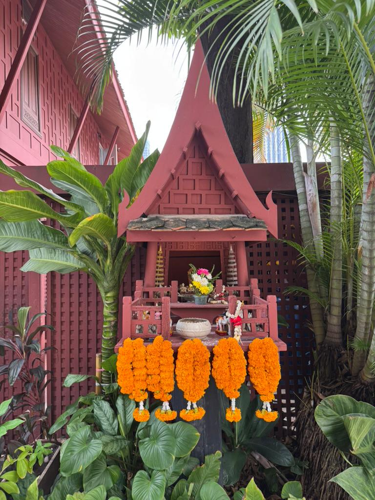 Spirit house with marigold garlands, Jim Thompson House.