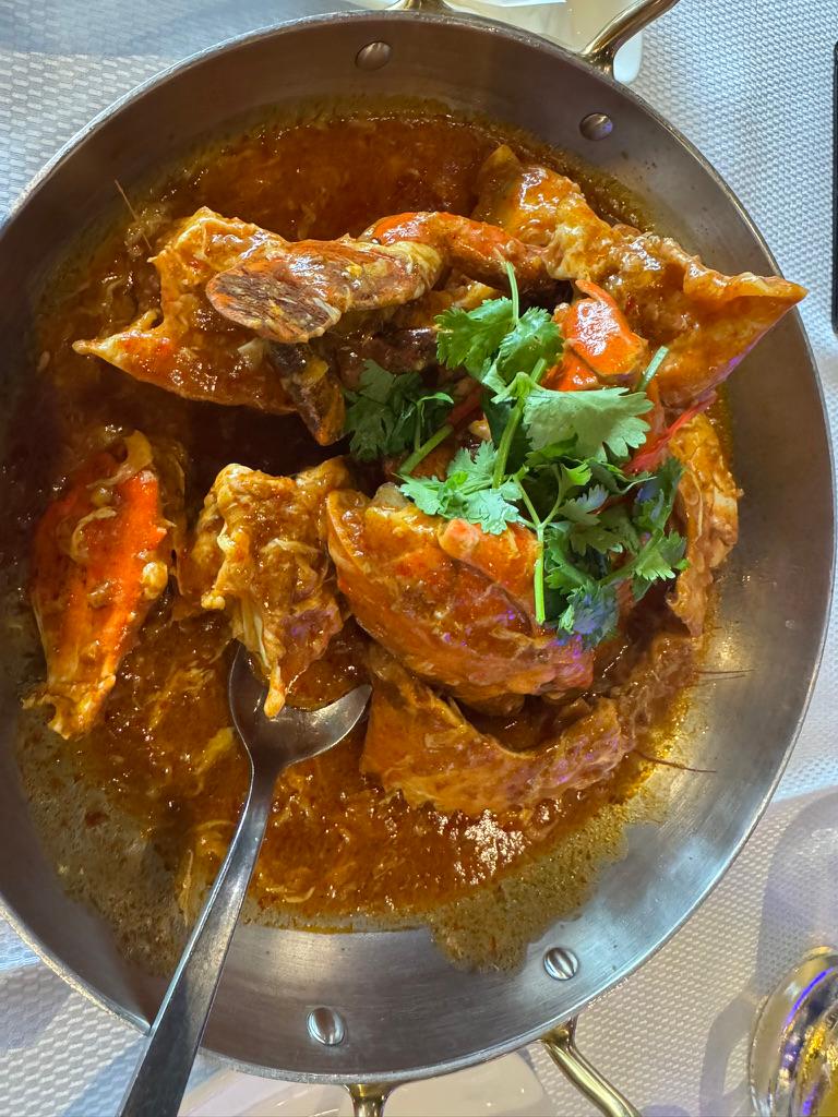 Chilli crab, mud crab with cilantro.