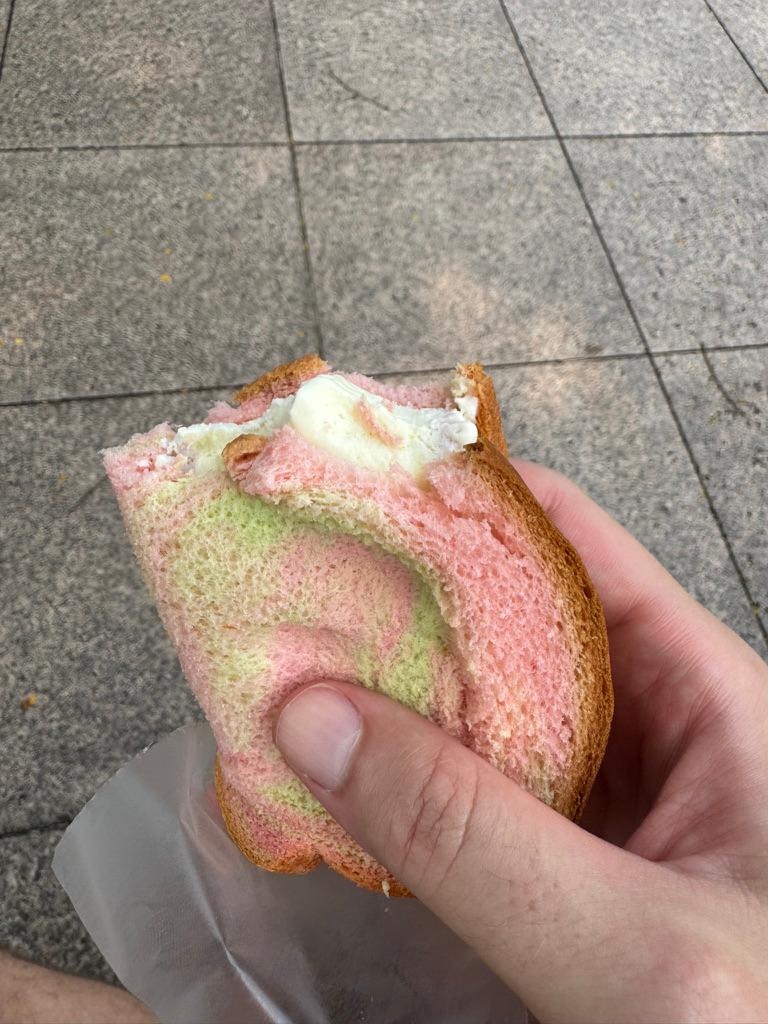 Magnolia ice cream slice served in rainbow bread.